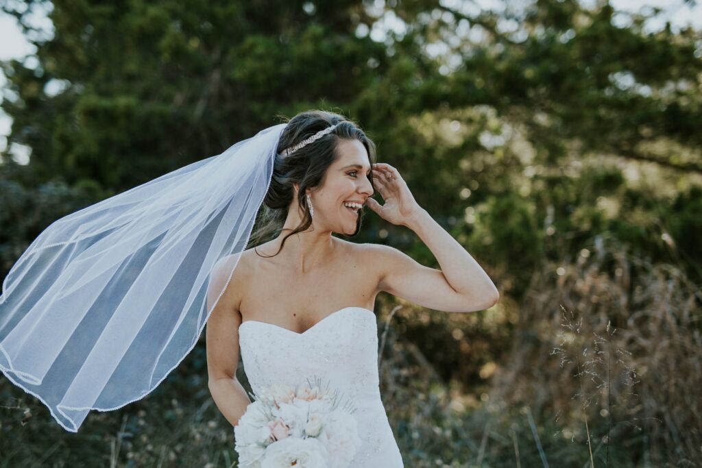 Bride in outdoor setting.